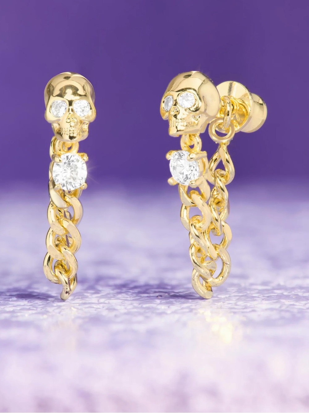 Melinda Maria Gold Skull Chain Hoop Earrings with Simulated Diamond Accents